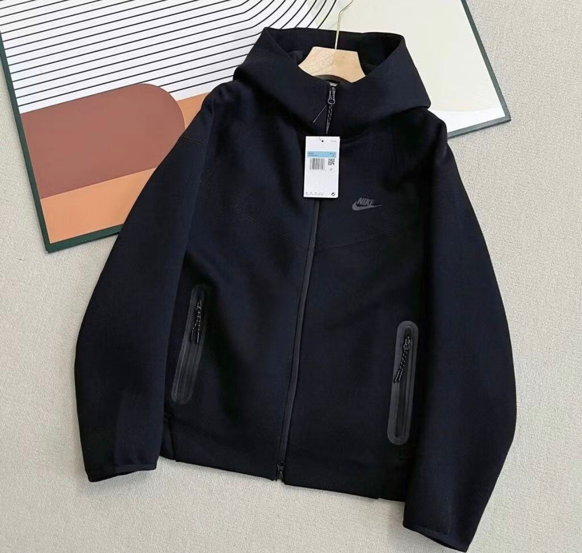 NIKE TECH NOVA